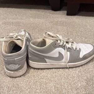 Nike Women’s  White and Gray Low-Top Air Jordans.